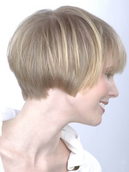 Side view of women's hair cut to ear length