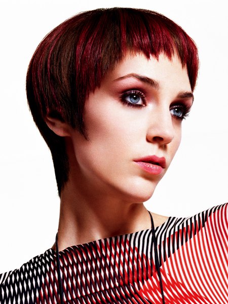 Chic short hairstyle for dark brown hair with a red shimmer