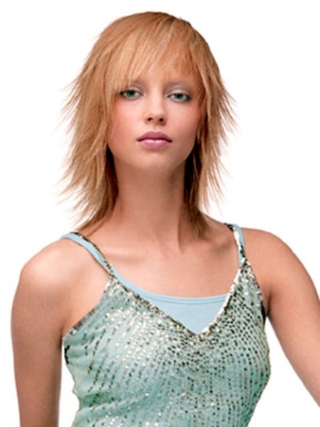 Youthful medium-length hairstyle with a long flippy nape