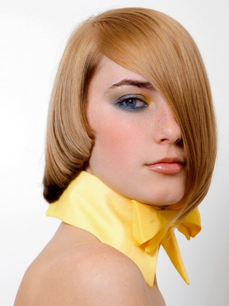 Fashionable bob with one shorter side seen from the side