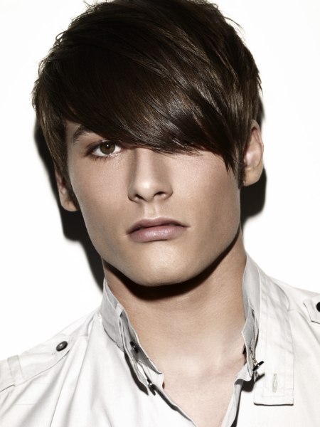 Short men's haircut with long bangs