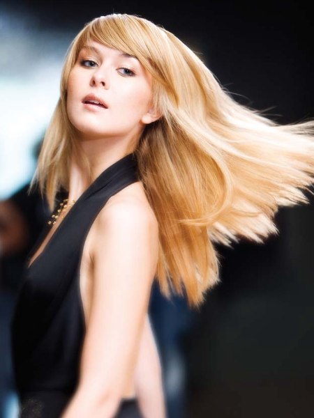Long blonde hair with razored ends