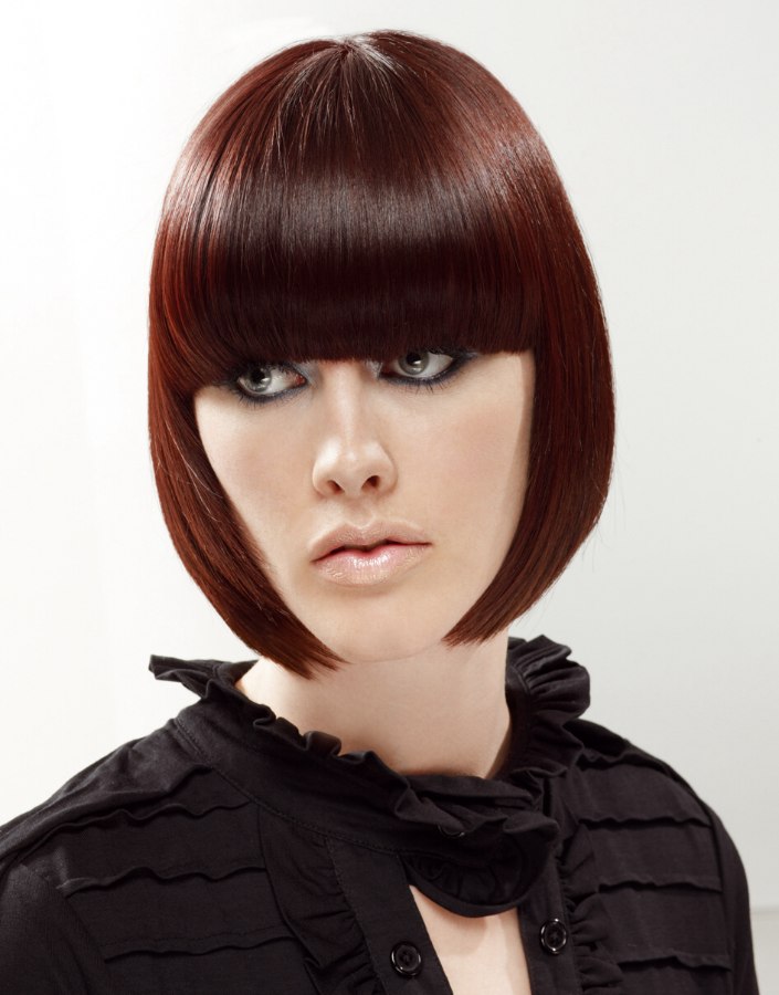 Chin length pageboy styled close to the face