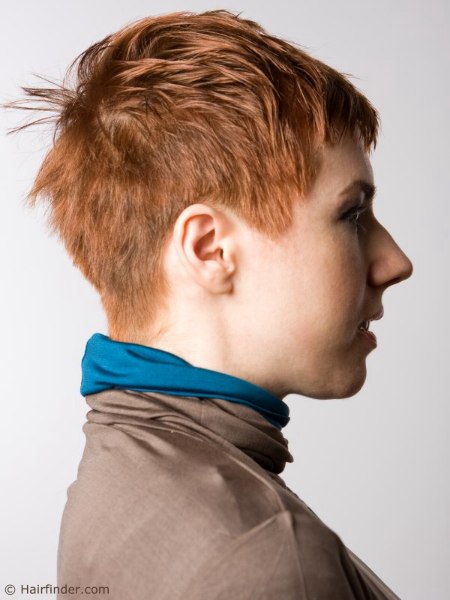 Side view of a choppy pixie cut with a very short nape