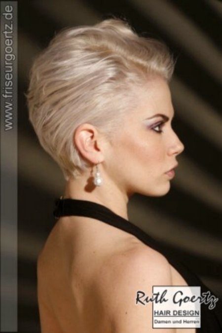 Short women's haircut with a very short neckline