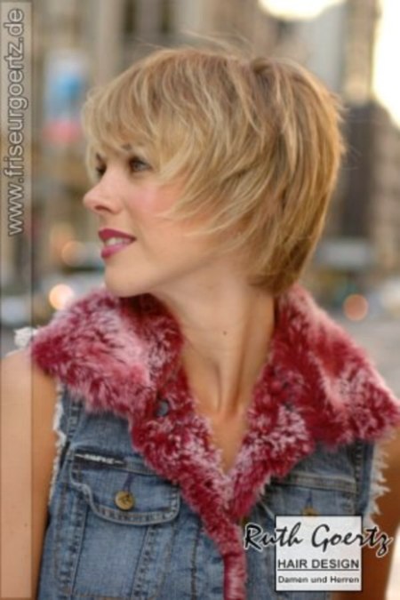 Side view of a short haircut with tapered sides