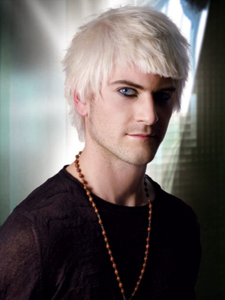 Man with choppy platinum blonde hair