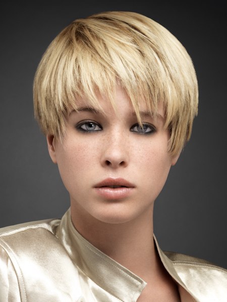 Cute short hairstyle with the hair on one side cut above the ear