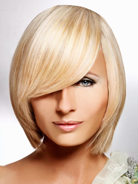 Semi short blonde hairstyle with tapered sides