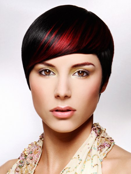 Short red hair with a black base color and red streaks