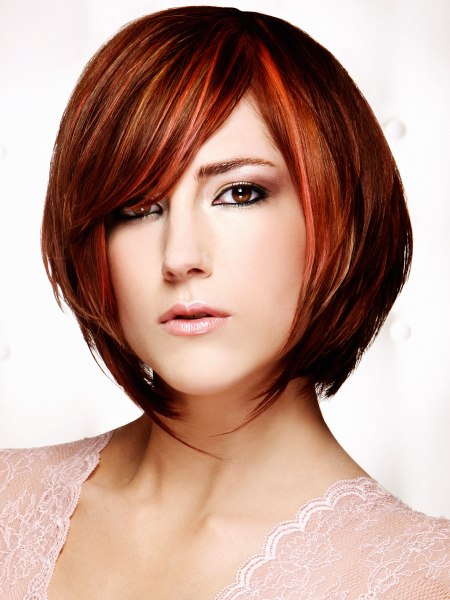 Modern short bob haircut with strands that accentuate the neck
