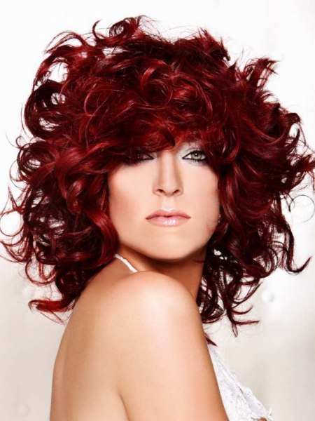 Shoulder long red hair with curls and volume