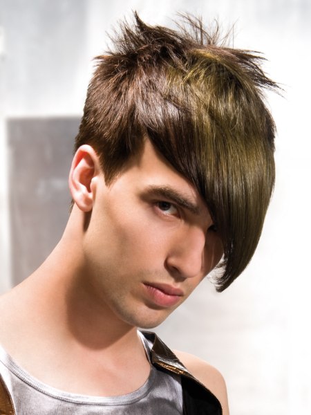 Men's haircut with much texture on the crown and very long pointed bangs