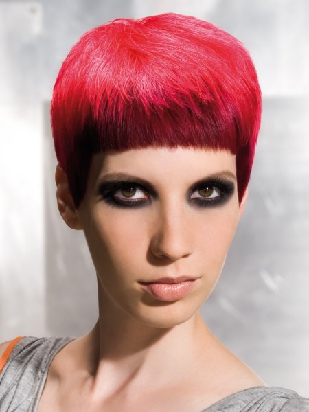 Short and smooth pink hair with a helmet like shape