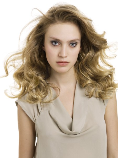 Ravishing long hairstyle with defined large waves and curls