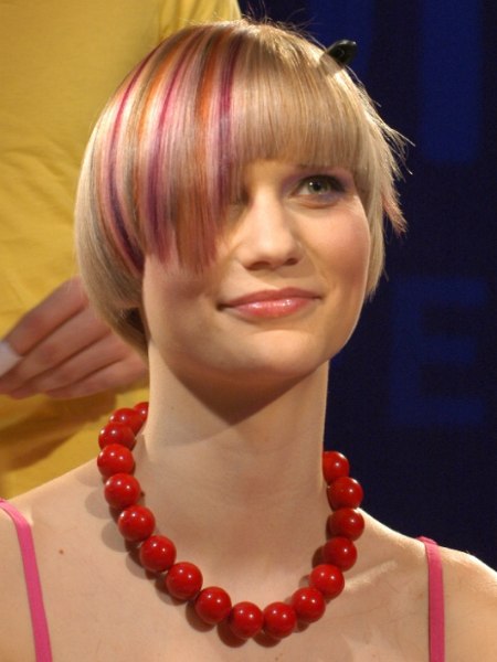 Short blonde hair with a colored stripe