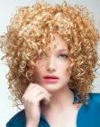 Shoulder length hair with corkscrew curls