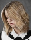Layered mid-length bob with slight curling