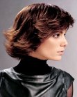 Layered medium length hair with upturned ends