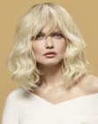 Airy blonde bob with subtle bangs