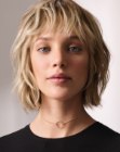 Versatile bob haircut with sculpted bangs