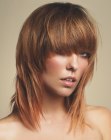 Shaggy medium length hair with razor-cut ends