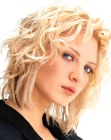 Blonde medium length bob with curls