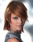 Medium length haircut with contrasts and diagonal styling