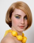 Asymmetrical middle length bob with curves that frame the face