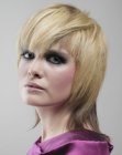 Savvy fashion haircut for medium long blonde hair