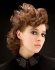 Pageboy cut hair styled into lasting curls