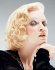 Blonde Marilyn Monroe hair with roller-set curls