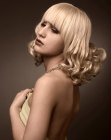 Shoulder length hair with edged bangs and spiral curls