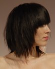 Neck-length haircut with heavy blunt cut bangs