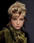 Avant garde look with medium length hair and box layering