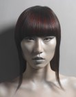 Sleek medium length hair with blunt cut bangs