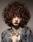 Blousing hair with spiral curls and much volume