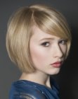 Neck-length bob with an angled parting
