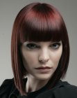 Trendy bob hairstyle with a rich red hair color