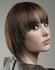 Sleek neck-length hairstyle with angled sides