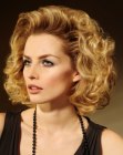 Elegant medium hairstyle with large soft curls