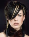 Dark hair with streaks and styled with freezing gel