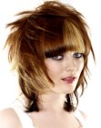 Hairstyle with spiky layers and heavy bangs