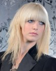 Blonde shoulder length hair with blunt cut bangs