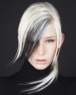 White hair with extensions to mimic black streaks