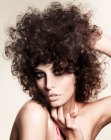 Layered hair with gravity defying curls