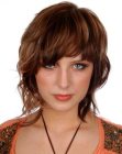 Highly-textured medium hairstyle with soft angled bangs