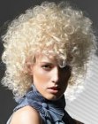 Platinum blonde hair with curls and huge volume