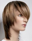 Medium length hairstyle with a fringed neckline