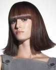 Medium length brunette bob with an outward swing